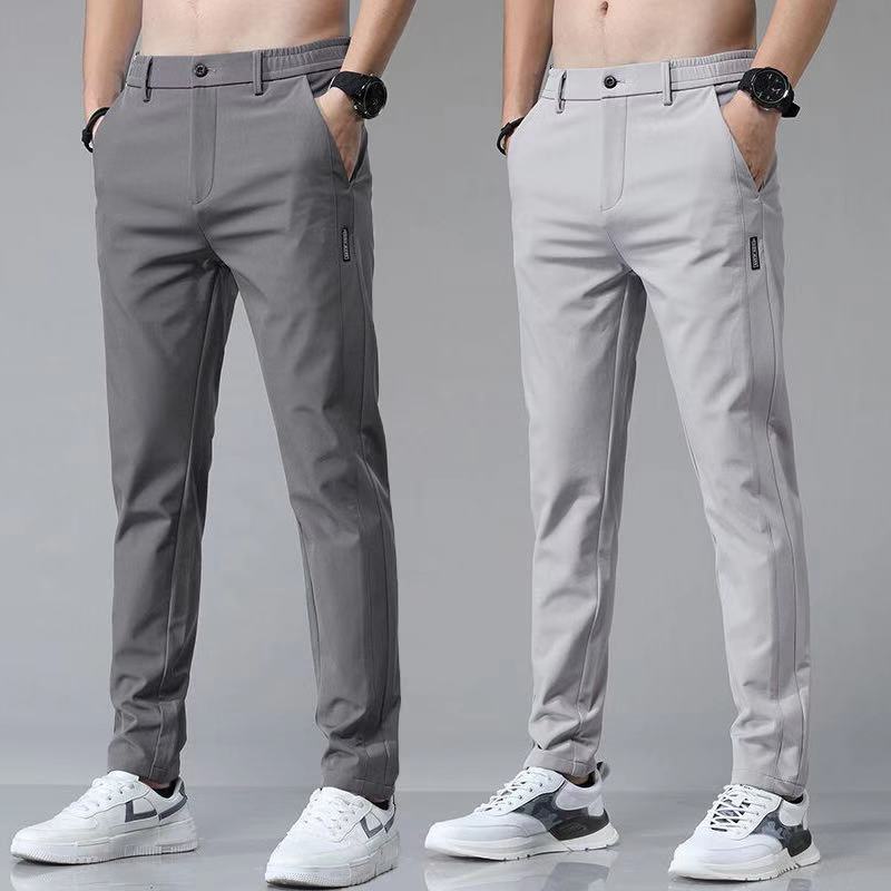 2023 pantalones casuales para hombres primavera y verano estilo coreano estiramiento de moda Pantalones slim fit pies de seda de hielo cintura elástica pantalones de color sólido para hombres