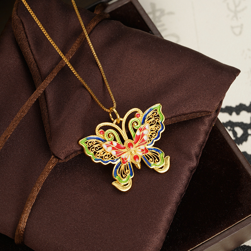 La herencia de la antigua ley de oro de arena vietnamita mariposa hueca color esmalte colgante de moda popular de moda nacional fuente popular