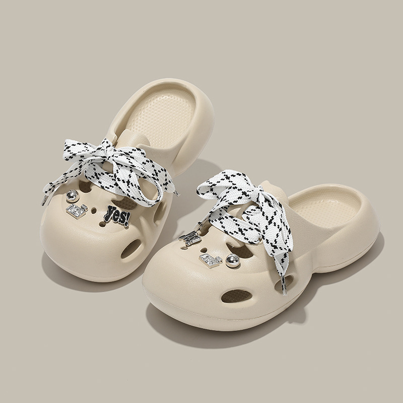 En nombre de la bowknot pisando la mierda, zapatos con agujeros, verano de mujer 2025, nuevo estilo, sandalias y pantuflas de suela gruesa, moda femenina