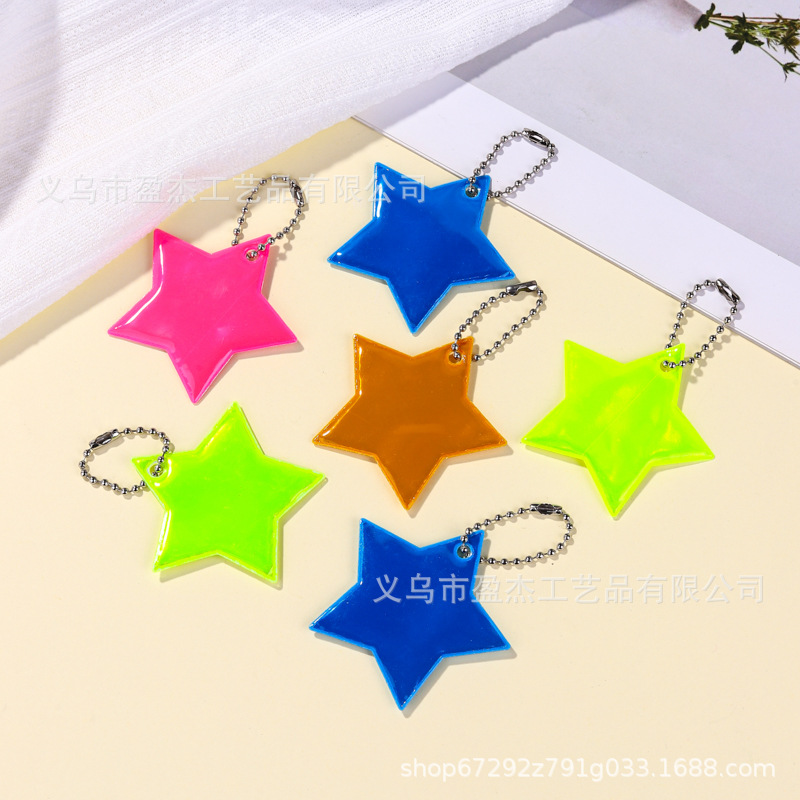 Amazon 5 cm colgante de color reflectante estrella de PVC de noche colgante de bolsas de llaves