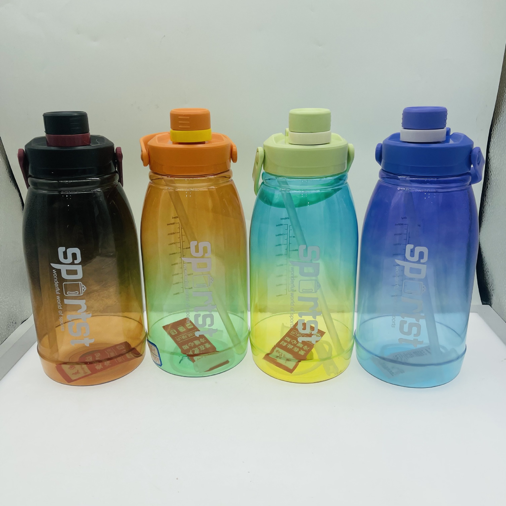 Youyun estudiante taza de agua de plástico colorido deportes al aire libre al por mayor portátil 2000ml espacio taza deportes hervidor al por mayor