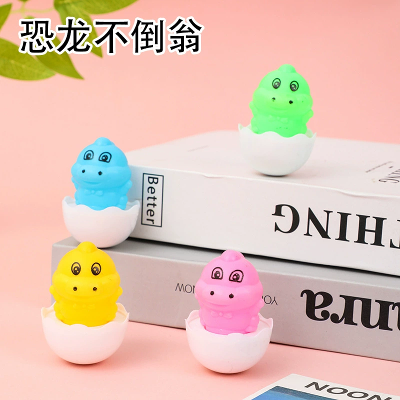 Трансграничный динозавр неваляшка игрушка ребенок учится лазить, чтобы успокоить детский сад