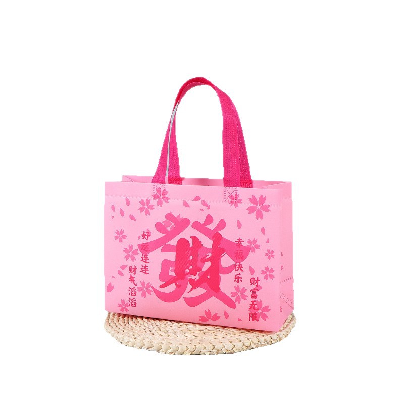 Bolsas de mano no tejidas al por mayor bolsas de embalaje estereoscópicas resistentes al desgaste bolsas de embalaje de dormitorios de estudiantes bolsas de mano en stock