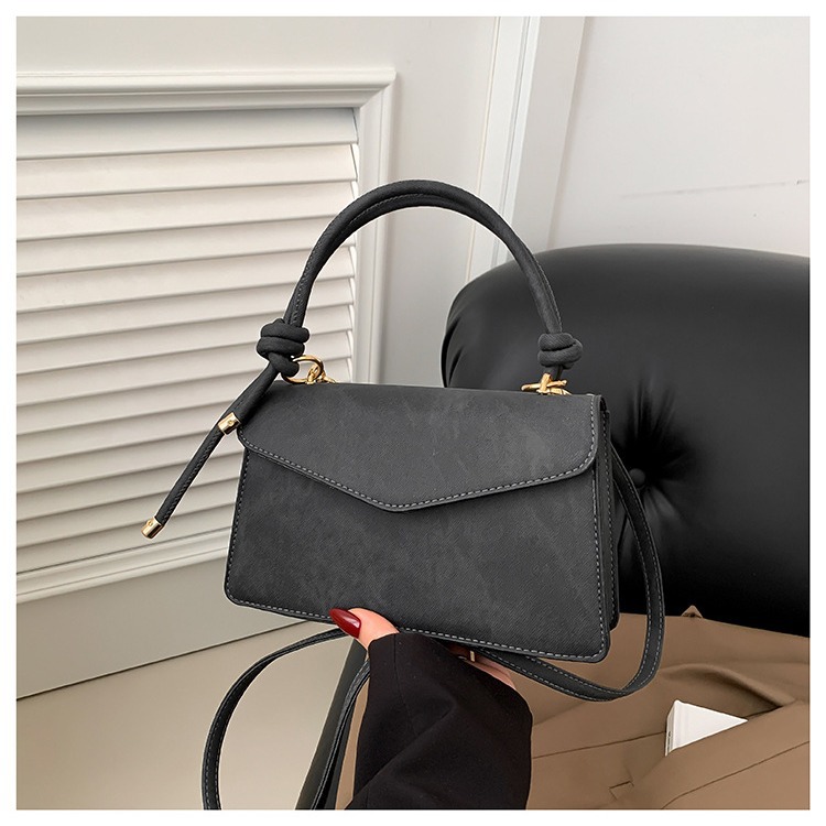 Neto rojo Joker tendencia de color sólido bolso simple bolso de las mujeres 2024 Invierno nuevo bolso cuadrado pequeño oblicuo Cruz Portátil Bolsa de costura del coche