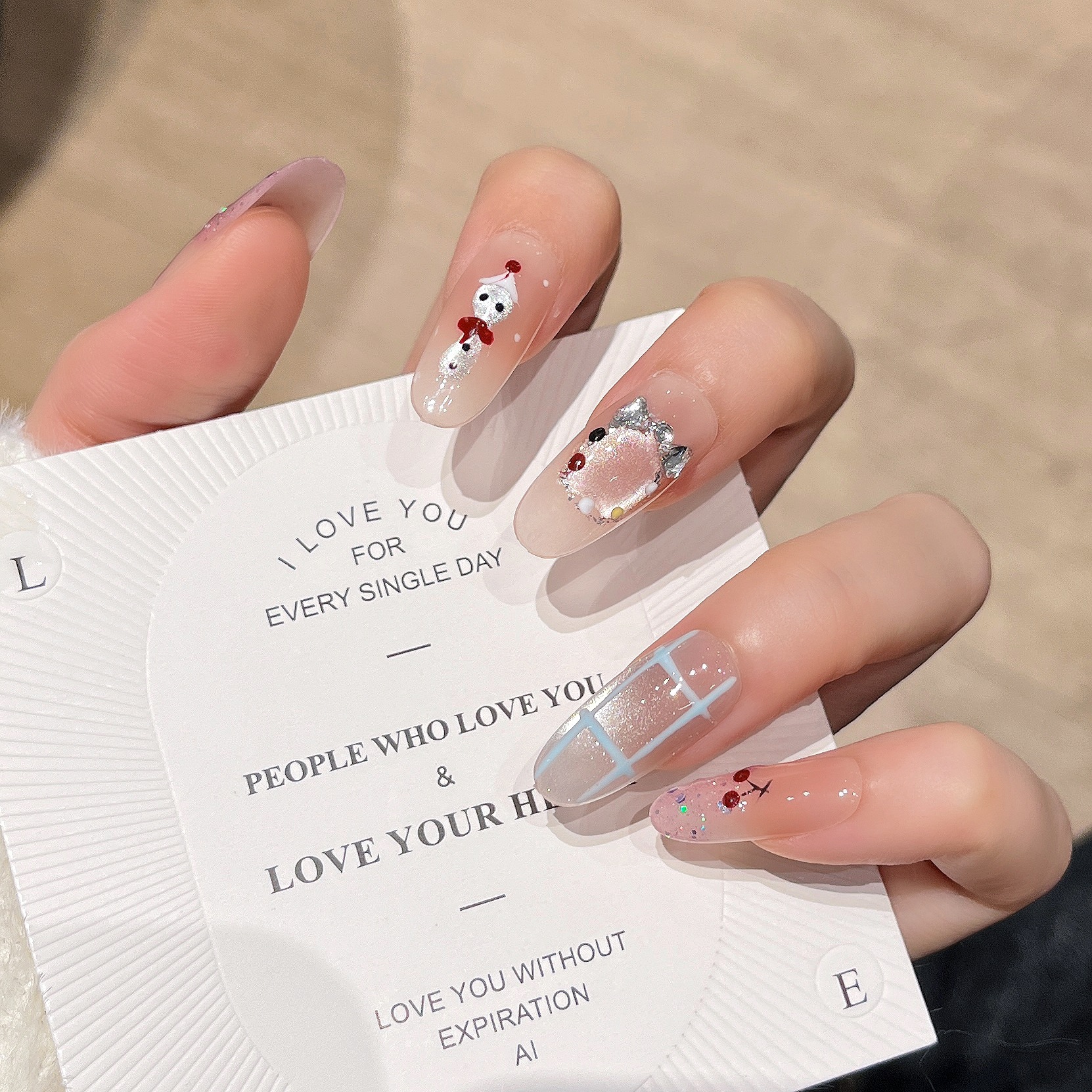 Otoño y invierno nuevos ojos de gato para usar uñas pintadas a mano adorables parches de uñas falsas de tamaño medio y largo productos terminados desmontables de uñas
