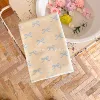 With bow, beige