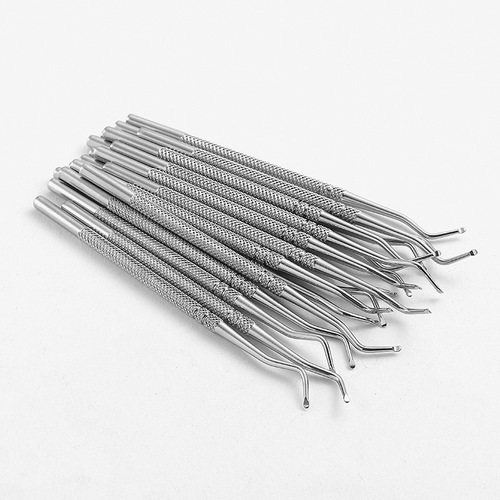 Manufacturer's dual-headed kick-up tool, embedded nail file, nail pick, groove scoop, toe nail cleaner, nail art tool