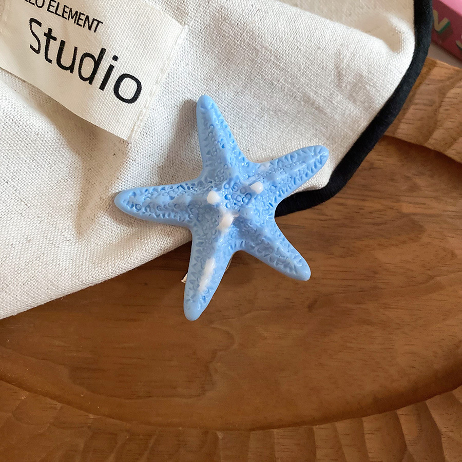 Vacaciones junto al mar viento estrella de mar horquilla moda tendencia de fotografía lateral clip de pico de pato sentido de alta gama accesorios para el cabello de todo fósforo mujeres