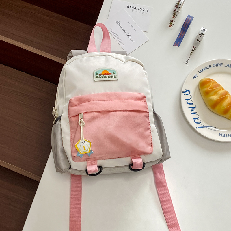 2025 mochila de moda coreana para niños y niñas, mochila para niños de jardín de infantes, nueva mochila para niños de color exterior