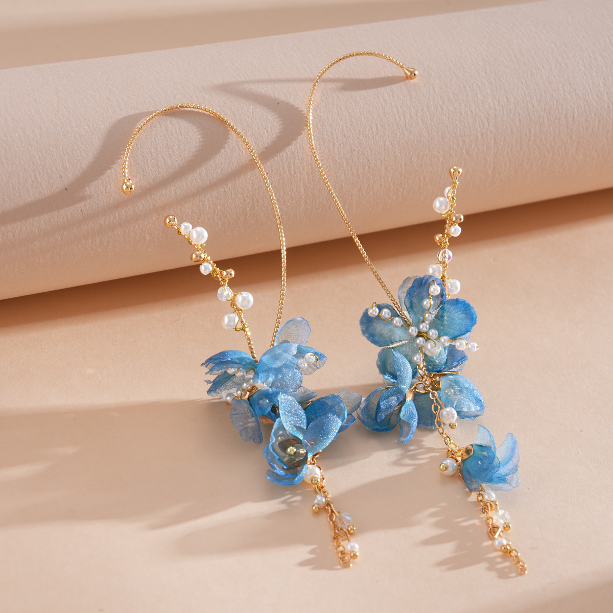 Europa y los Estados Unidos super inmortal vidrio de perla chiffon flor de bordillo personalidad dulce aretes de aretes de vacaciones de mar aretes de viento