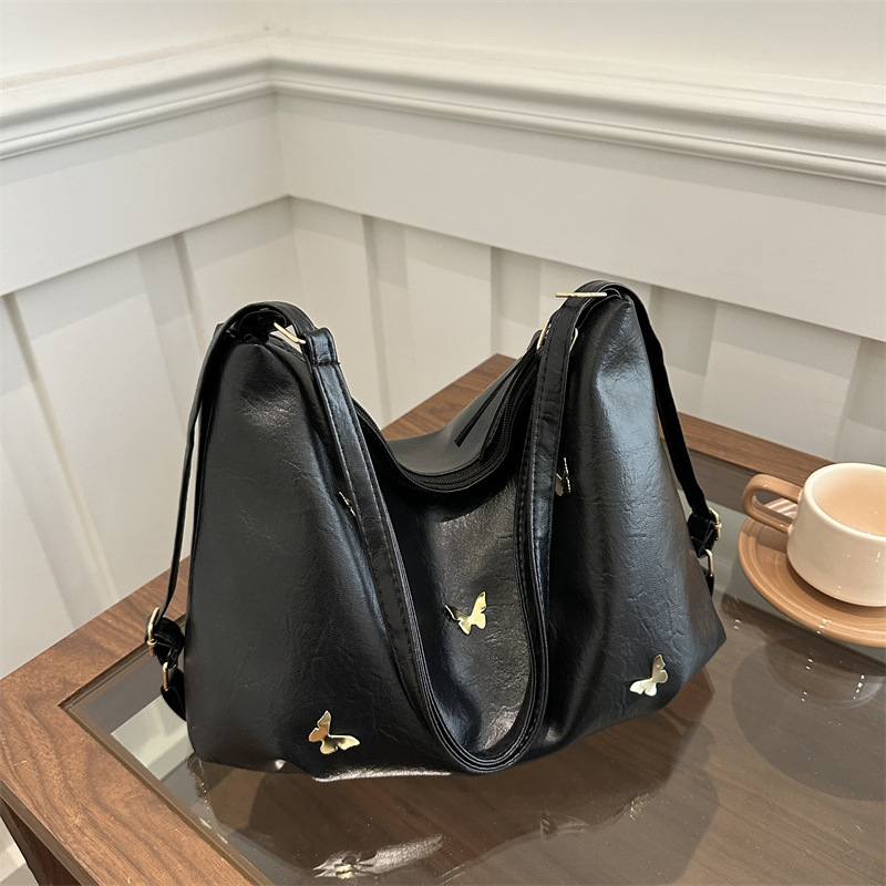 Nicho de diseño sensación de bolso de gran capacidad bolso de mujer 2024 nuevo invierno retro de hombro mochila de hombro