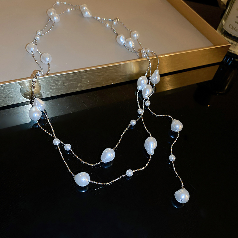 Collar con cuentas de perlas de gota de agua con diamantes transfronterizos otoño e invierno cadena de suéter de lujo ligero francés moda todo fósforo joyería de alta gama