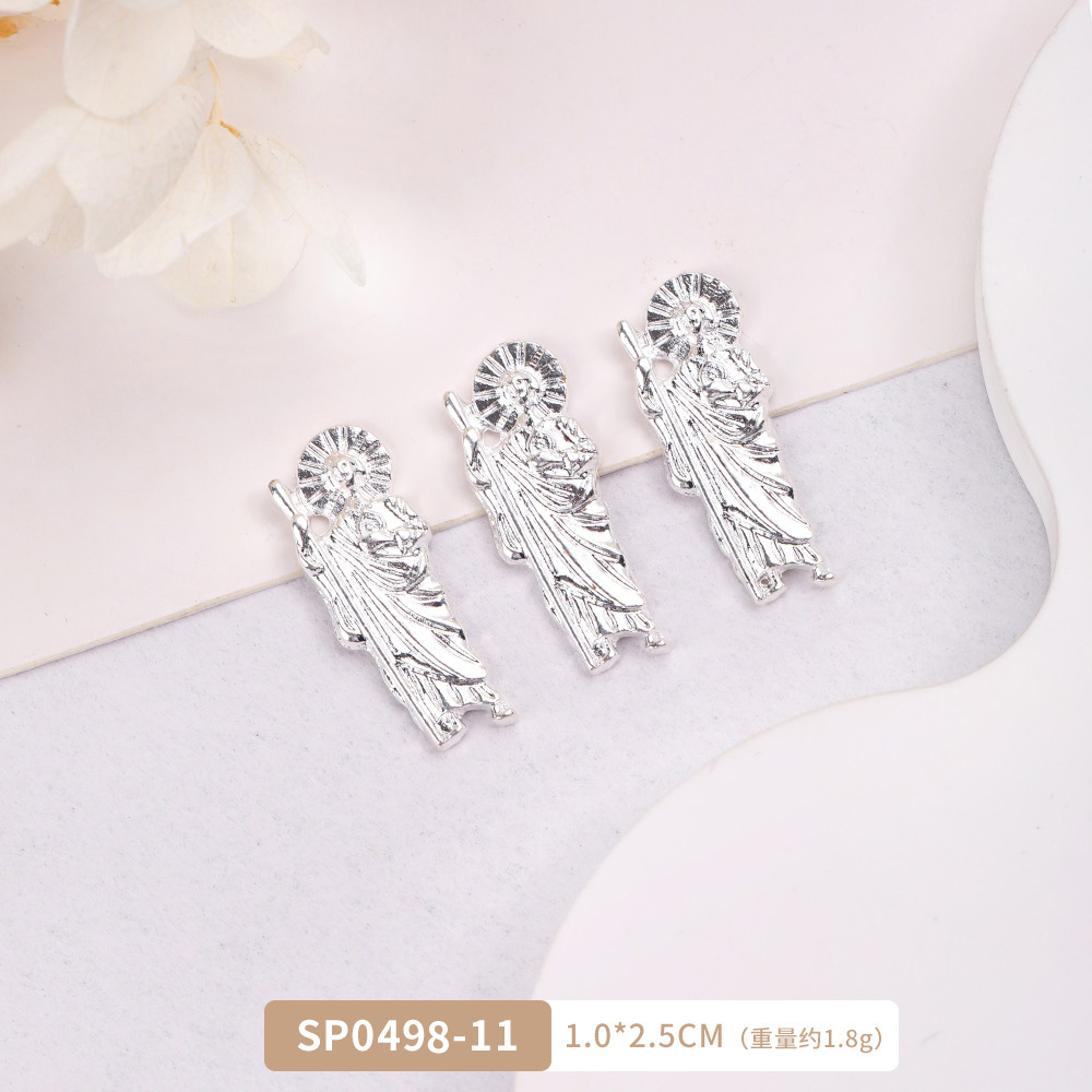 Arte de uñas transfronterizo Jesús accesorios de metal DIY vintage metal aleación uñas arte joyería europea y americana Luz de lujo accesorios con diamante