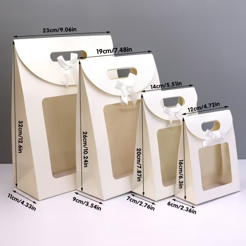 Navidad abre la ventana con lazo y solapa, el escaparate es transparente, estilo ins, el novato de xiaoqing lleva la bolsa de regalo.