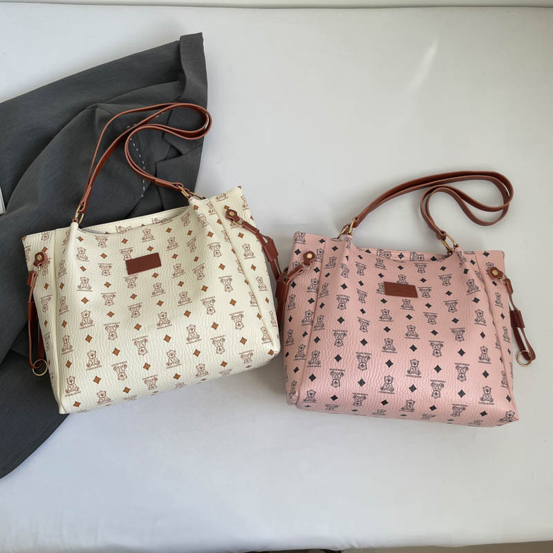 Retro 2025 nuevo estilo de moda de viaje de hombro bolso de brazo de mujer textura universal bolso de mano gran capacidad