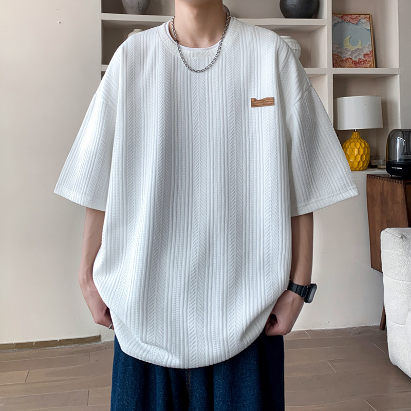 Camiseta de manga corta de verano de Hong Kong Tide para hombres inins coreanos sueltos versátiles Jacquard camiseta de cuello redondo de marca de marea chaqueta transpirable