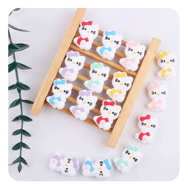 Productos creativos para bebés DIY dibujos animados animales karting gatos silicona bebé tetina cadena de dientes molares accesorios de pulsera de diente