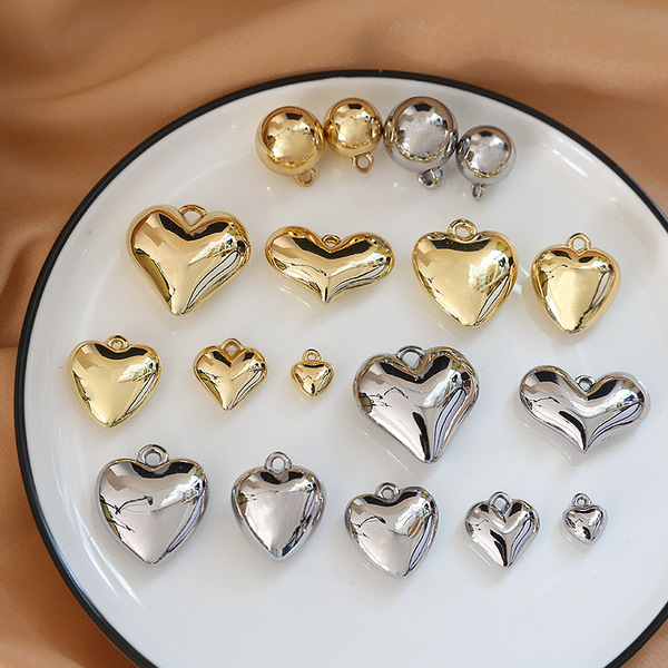 Three dimensional glossy pendant heart-shaped