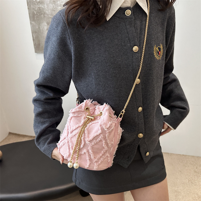 Nicho de diseño bolso de cubo otoño 2024 nuevo bolso de cordón de dibujo bolso de mujer mochila de moda simple bolso de hombro