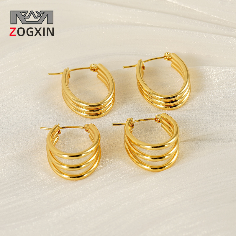 Pendientes circulares multicapa europeos y americanos transfronterizos Pendientes de acero de titanio simples y versátiles Pendientes de acero inoxidable en forma de U