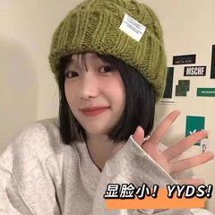 新型の帽子の女性の太いニットの毛糸の帽子の秋冬の百合の大きい頭の周りの緑色のゆったりしているinsの潮は顔が小さいことを現します。