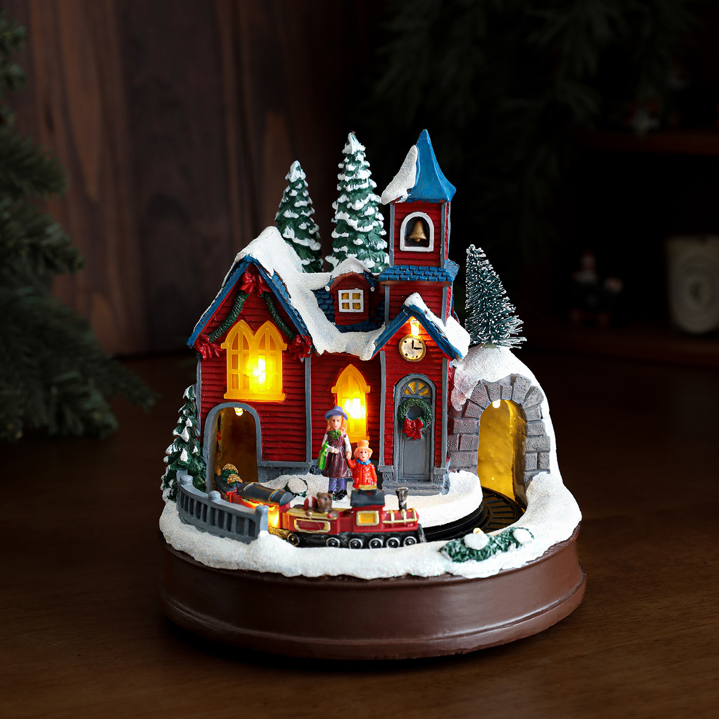 Casa de Navidad de color de resina puede girar el tren luminoso de luz de color caja de música decoración de escritorio de Navidad