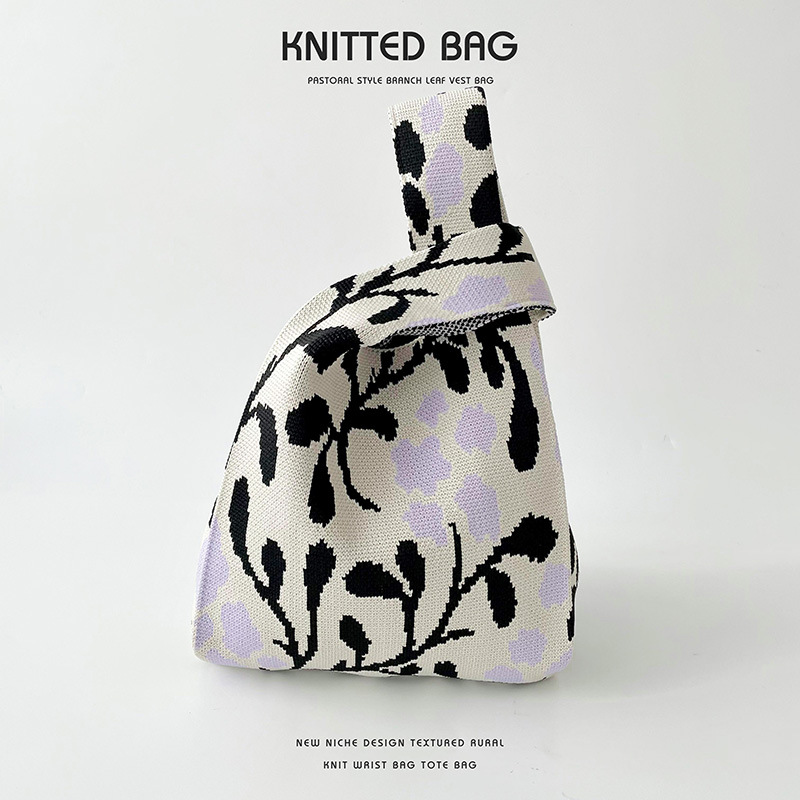 Primavera y verano estilo coreano todo fósforo pequeño bolso floral fresco personalidad todo partido bolso de hombro de punto gran capacidad fábrica al por mayor