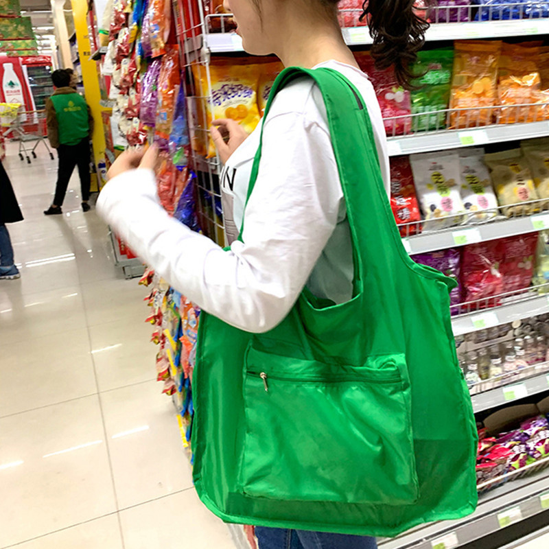Folding handheld shopping bag