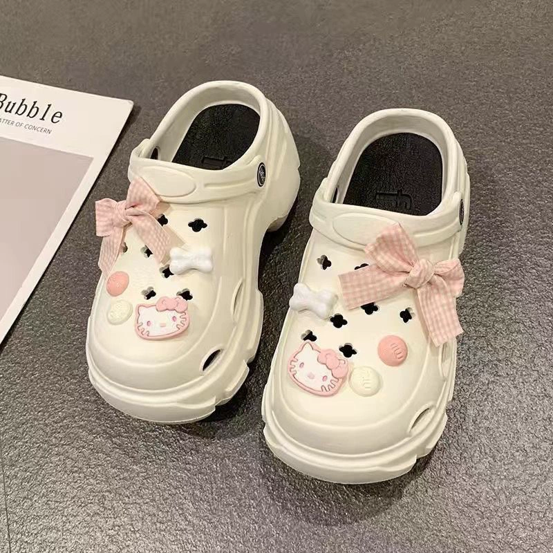 Пещерные туфли женщины носят летом 2023 новый супер толстой подошве модной сети красный увеличенный нескользящий и неприятный запах холодные тапочки женщины