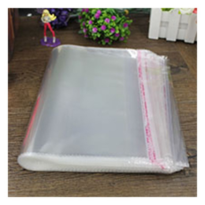 Bolsa de OPP de fábrica en stock bolsa de embalaje pequeña transparente al por mayor bolsa de ropa de plástico grande engrosada bolsa autoadhesiva