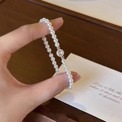 優しいフレンチレトロパールブレスレット、新しいニッチな気質、マイクロ象嵌シェルビーズ、多用途でエレガントな宮殿スタイルのブレスレット