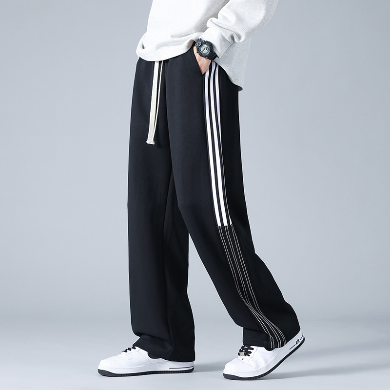 Pantalones deportivos a rayas estadounidenses para hombres y mujeres 2024 pantalones casuales rectos de cintura alta cuerdas sueltas pantalones al por mayor