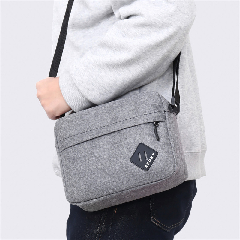 Nuevo bolso de tela Oxford ligero, bolso de hombro simple de moda para hombres, bolso de viaje de negocios, bolso de hombre casual vertical