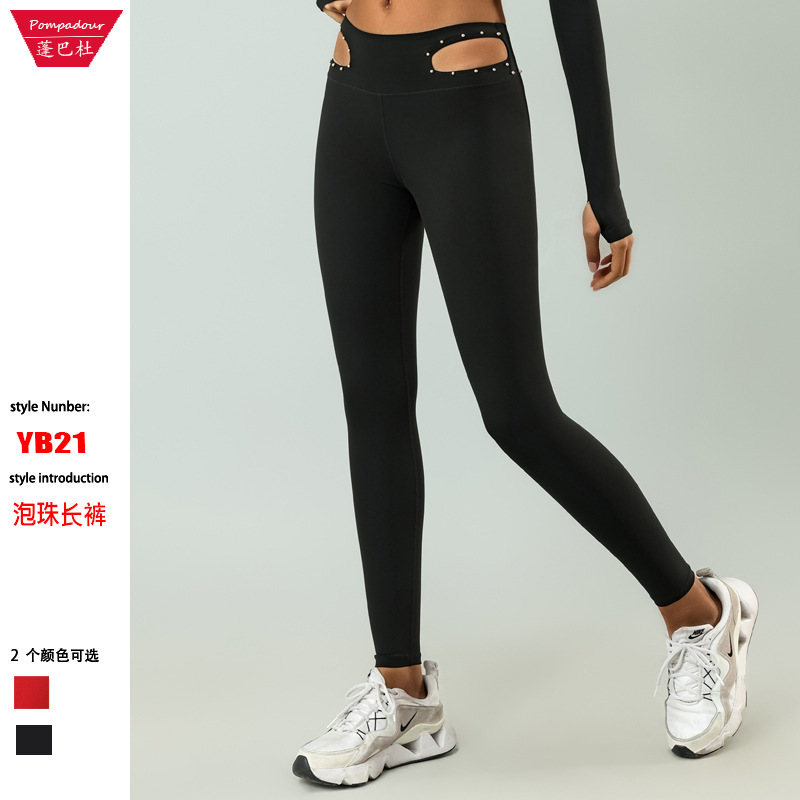Pantalones de yoga transfronterizos de comercio exterior europeos y americanos pantalones de yoga de mujer huecos elásticos de secado rápido de cintura media-alta Reparación de piernas fitness deportes pantalones cortos