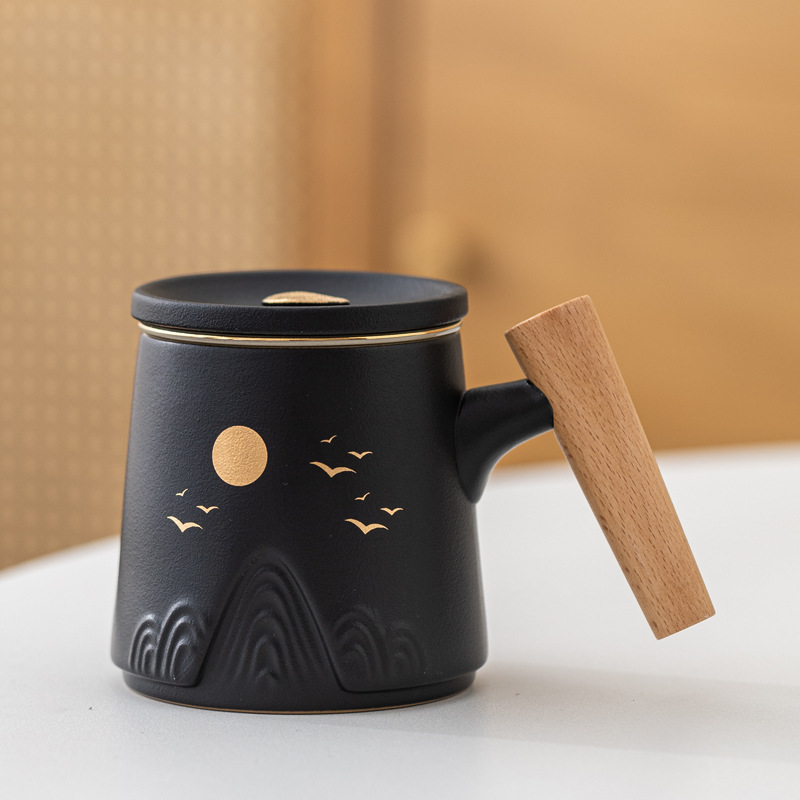 Guofeng Wenchuang marca taza de cerámica Zhoushan tres piezas juego de regalo de mano taza de calentamiento tallado comercial LOGO nombre