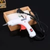 Glue gun, you need to buy glue stick to use together