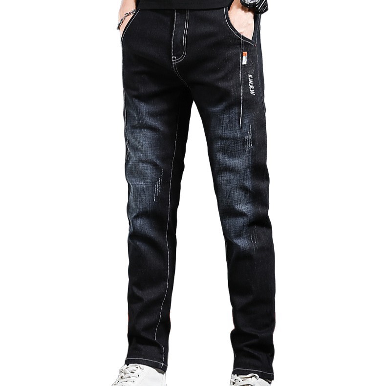 2026 nuevos jeans de hombre otoño y invierno delgados pies negros gruesos pantalones de tendencia de primavera y otoño