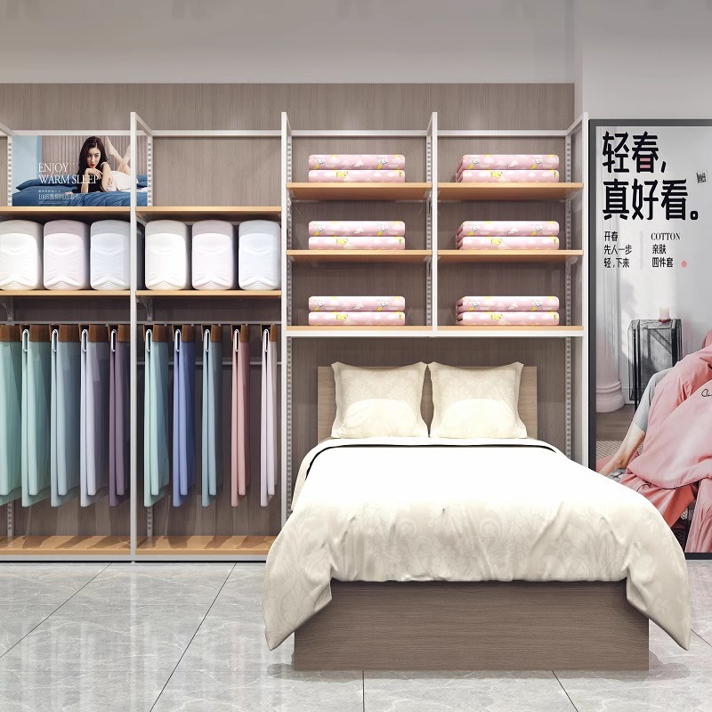 Estante de tienda textil casera almohada edredón estante de exhibición de cuatro piezas conjunto de ropa de cama pijamas estante de exhibición Gabinete