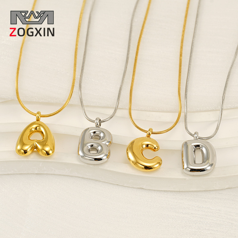Burbujas transfronterizas 26 letras inglesas colgante brillante collar nicho universal oro acero titanio joyería collar