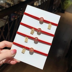 Celebrity-style red alloy hair ties with "Gong Xi Fa Cai" for the New Year—auspicious blessing hair bands, hair accessories, and headwear available wholesale