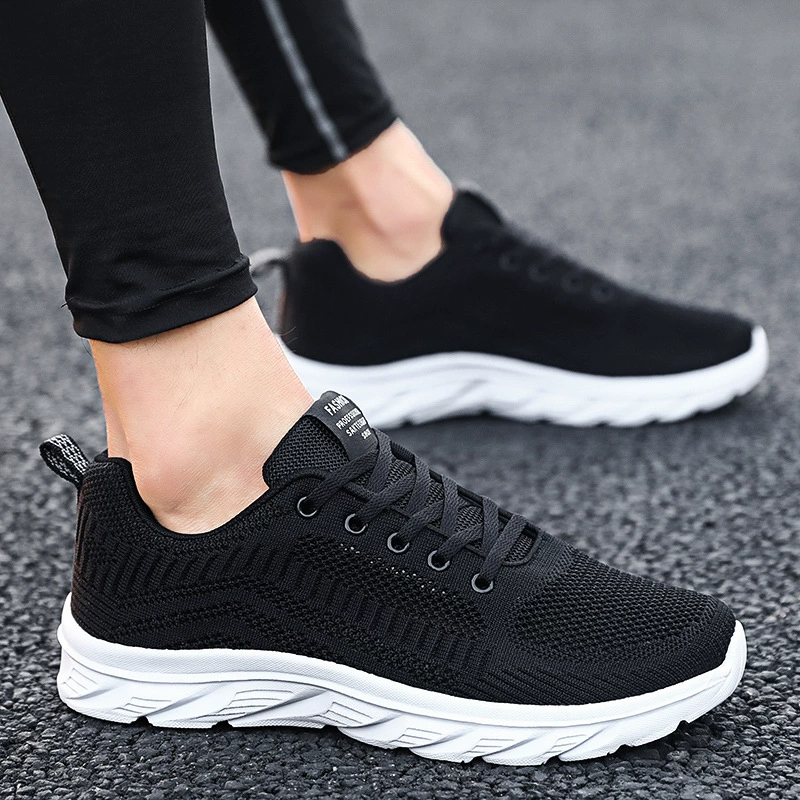 Весенний и осенний новый стиль спортивная повседневная обувь трансграничная мужская гиперразмер дышащая сетка летающая обувь для бега путешествия мужская обувь оптом