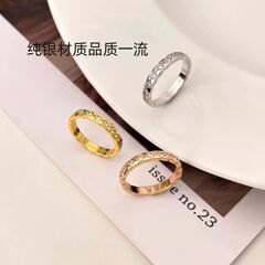 純銀の新型の小さい香風の菱の格子縞の指輪の狭い版はドリルの男女のカップルの指輪のメーカーを持って直接販売します。