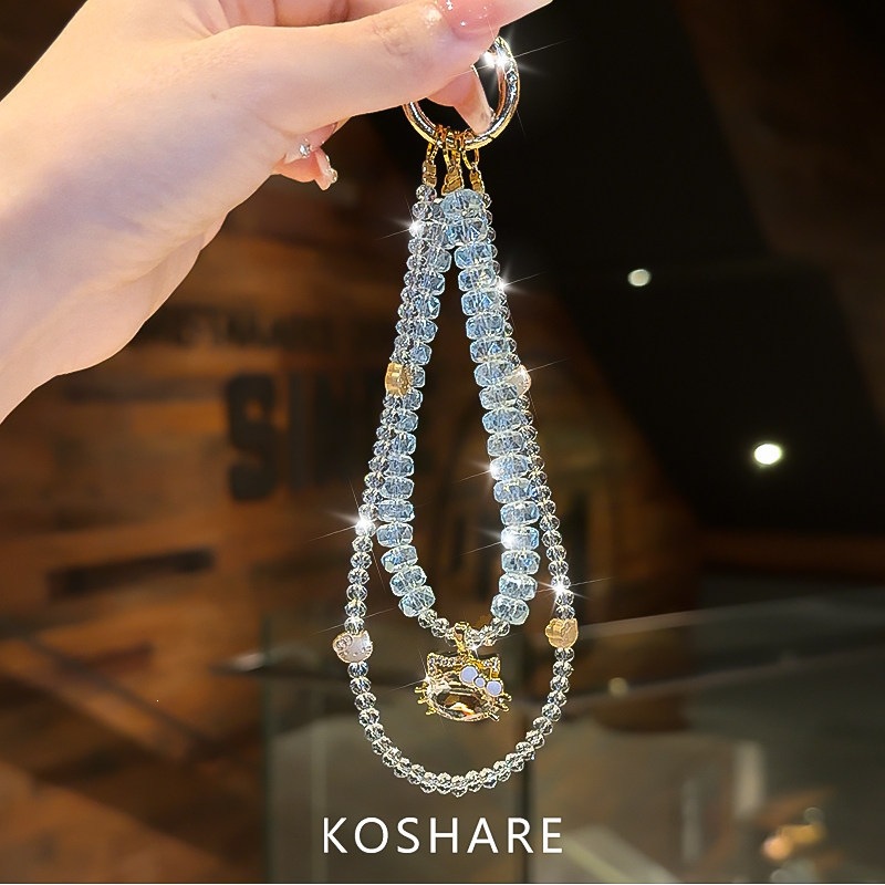 Honey Peach Cat Flash Diamond cadena de teléfonos móviles ligera de lujo nicho de alta calidad bolsos de cristal colgante colgante de mano lindos dibujos animados