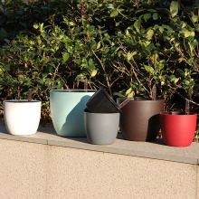 厂家直供懒人花盆 圆形简约桌面阳台树脂自吸水懒人花盆 批发