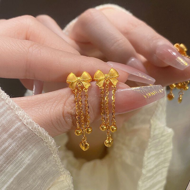 女性用の新しい中国風のゴールデンリボンタッセルイヤリング、レトロ、甘い、多用途、軽い高級感、ハイエンドのイヤリング。|undefined