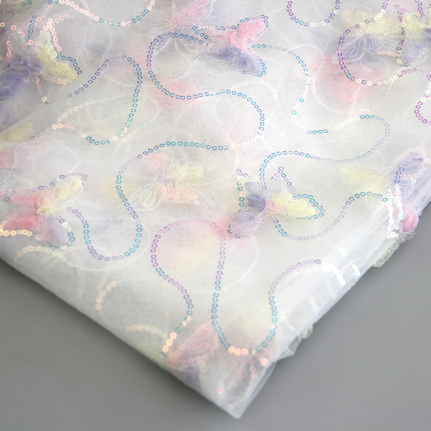 Spot three-dimensional tray with embroidered colored butterfly…