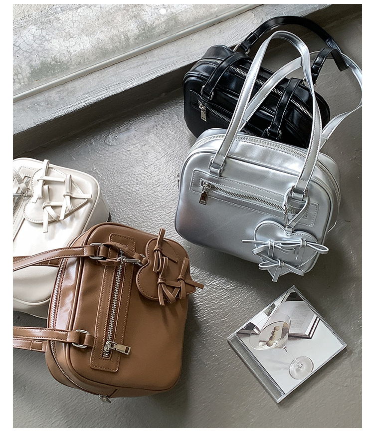 Typed shoulder for girls with a high-end feel, Korean version new small square bag, simple bow, heart-shaped decoration,_voghion.com