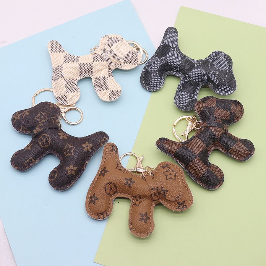 Llavero de cachorro creativo multicolor colgante de cuero cuero imitación lindo llavero de perro colgante de bolso multicolor al por mayor