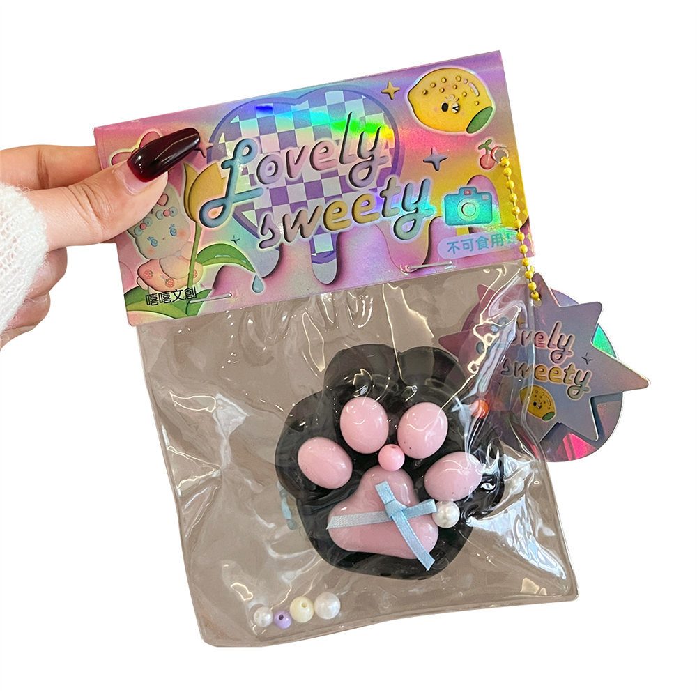 Pequeño libro rojo con el mismo estilo, grandes garras de gato perla, pellizcos, juguetes de descompresión, niña linda, artefacto de descompresión divertido al por mayor