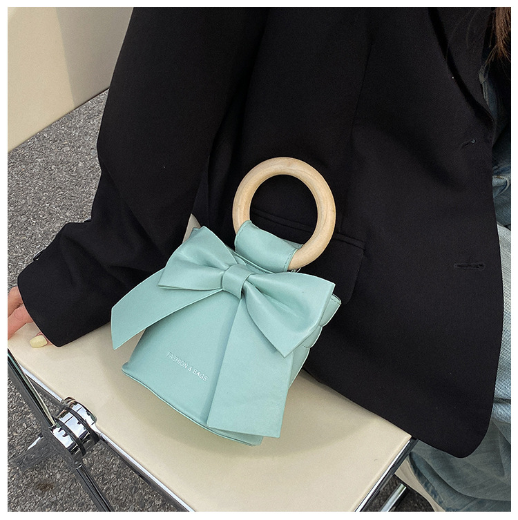 455g Weight Synthetic Leather Lining Material Sewing Thread Fashion Element Magnetic Buckle Closure Type Single Shoulder Strap, Double Handle Strap Type Bucket Bag Bags Type Casual Occasion Pu Leather Material Bow Knot Pattern All Seasons Season Women's Gender Elegant Style Bucket Shape Small Size Women's Small Pu Leather Bow Knot Elegant Sewing Thread Bucket Magnetic Buckle Bucket Bag 10